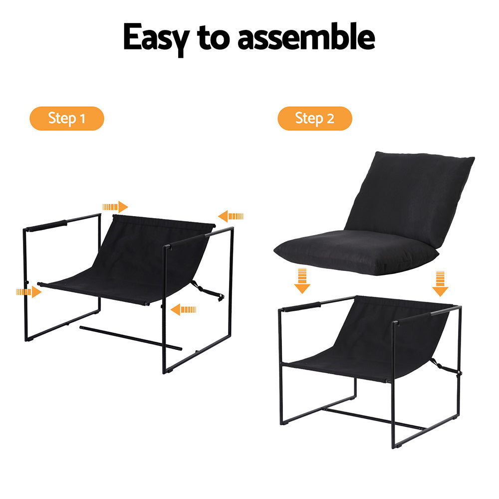 Black lounge chair with padded seat and back on black metal frame