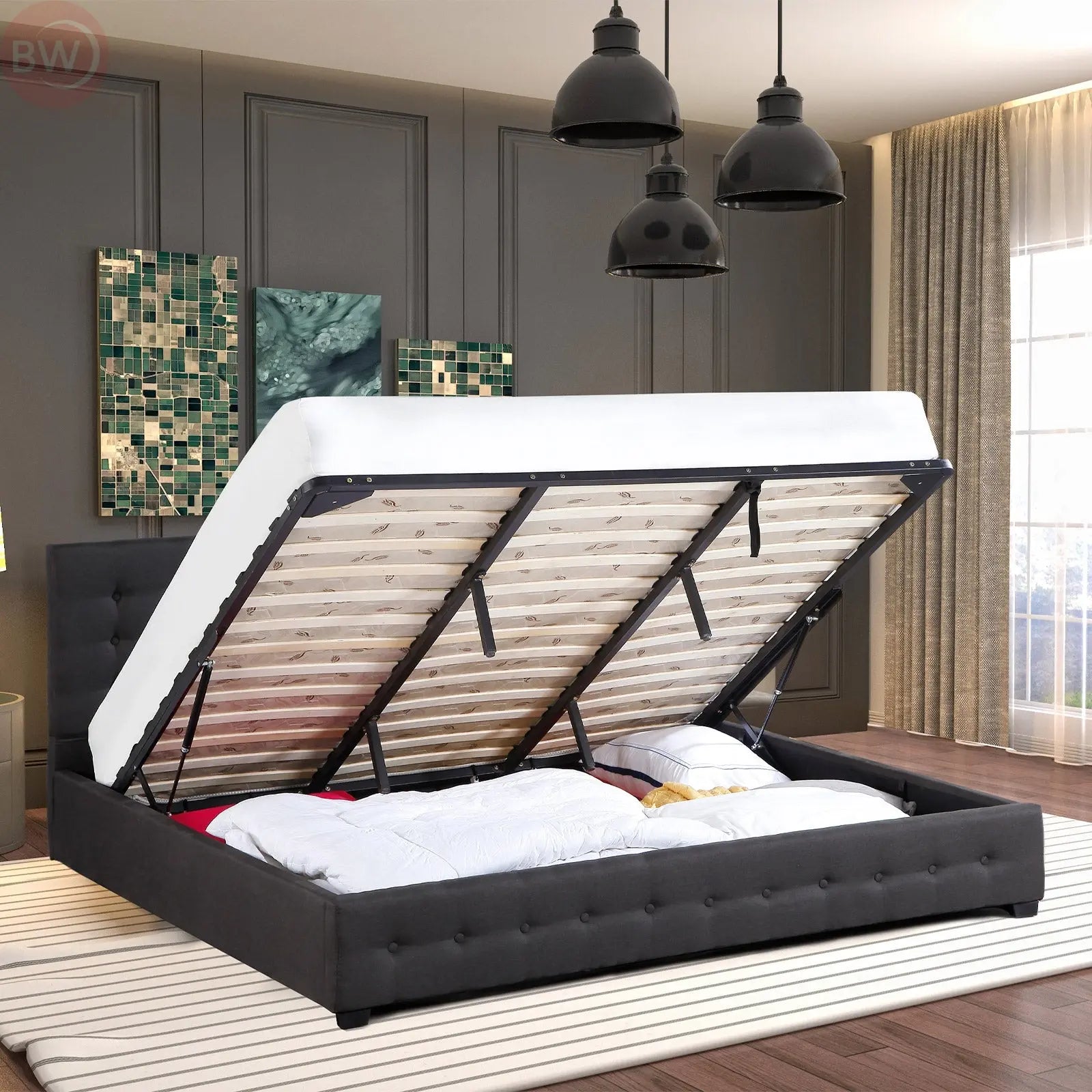 Dark grey upholstered king bed with winged headboard and open gas-lift frame