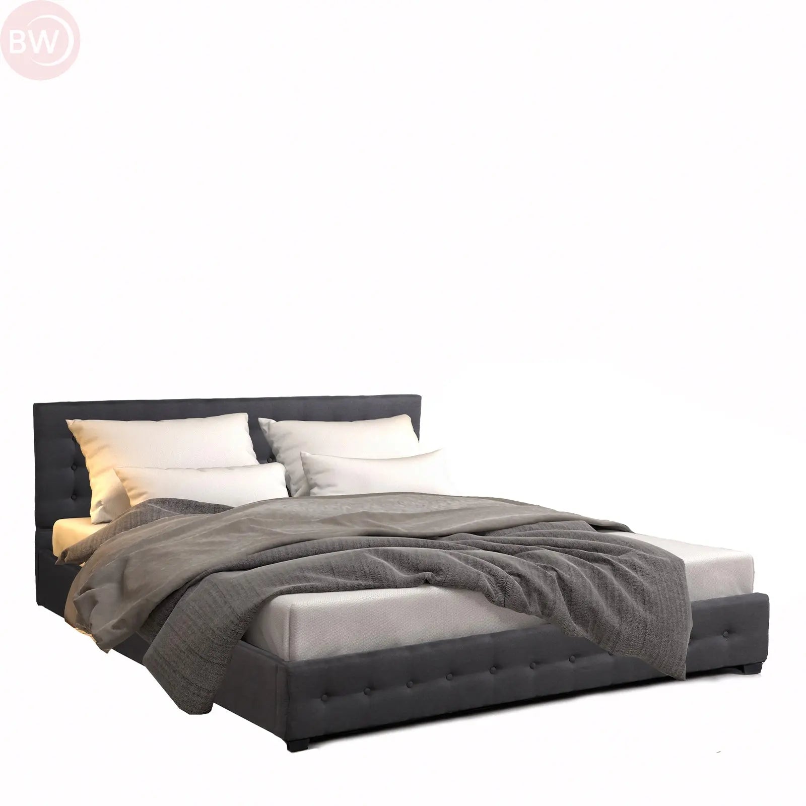 Dark grey upholstered king bed with button-tufted headboard and folded blanket