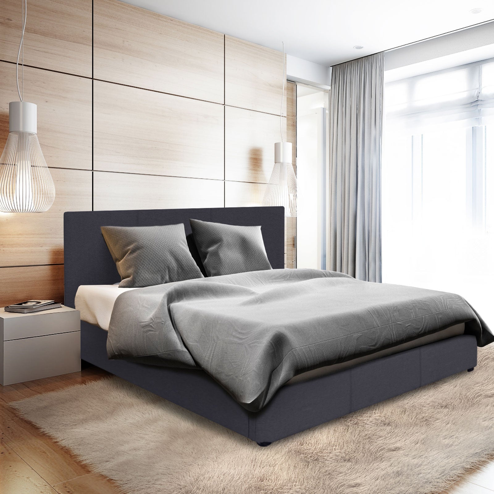 Charcoal double upholstered bed with tall headboard and dark bed base