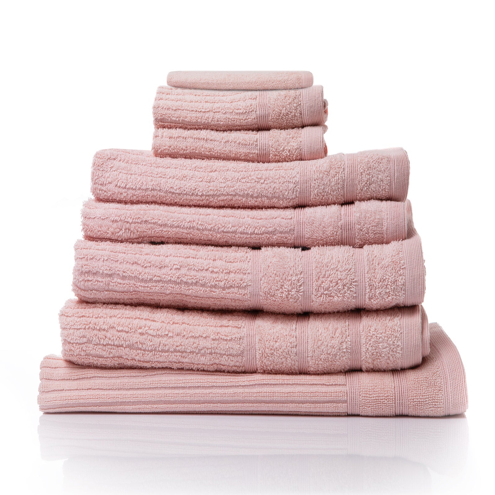 Blush bath towel set with 8 pieces, neatly folded in a stacked display.