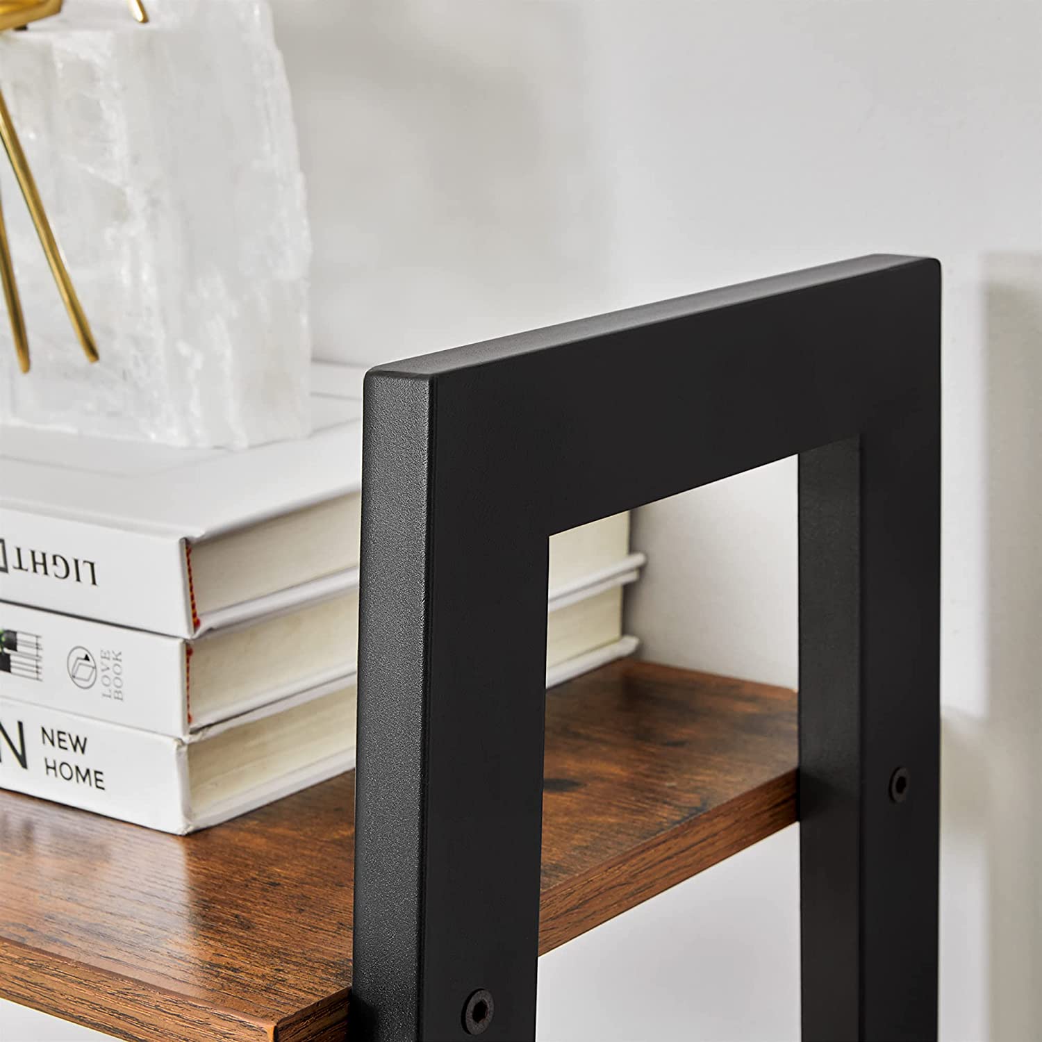 Black metal bookshelf frame with rustic brown shelves, open interior