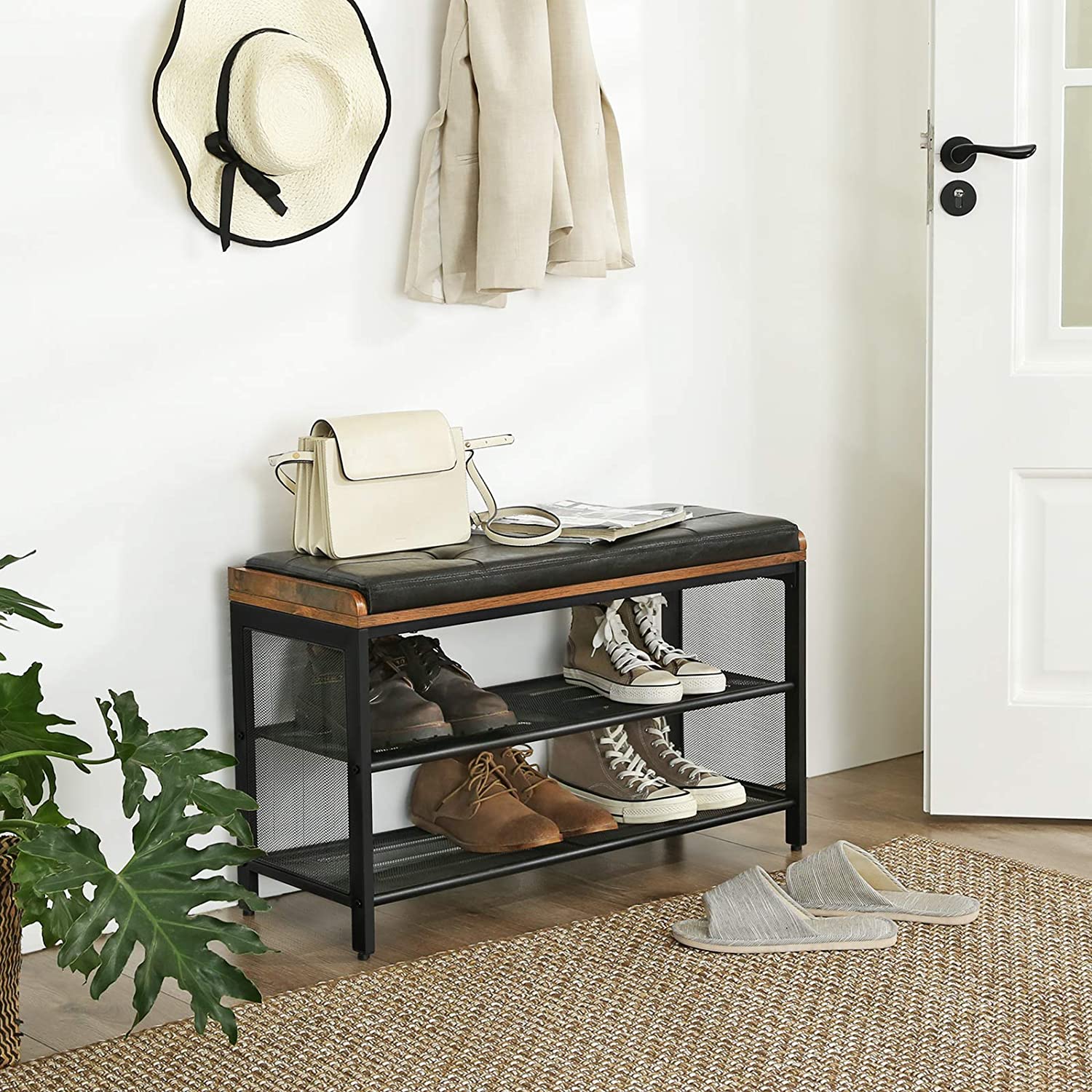 Entryway shoe bench with faux leather top and two wire mesh shelves, dark frame