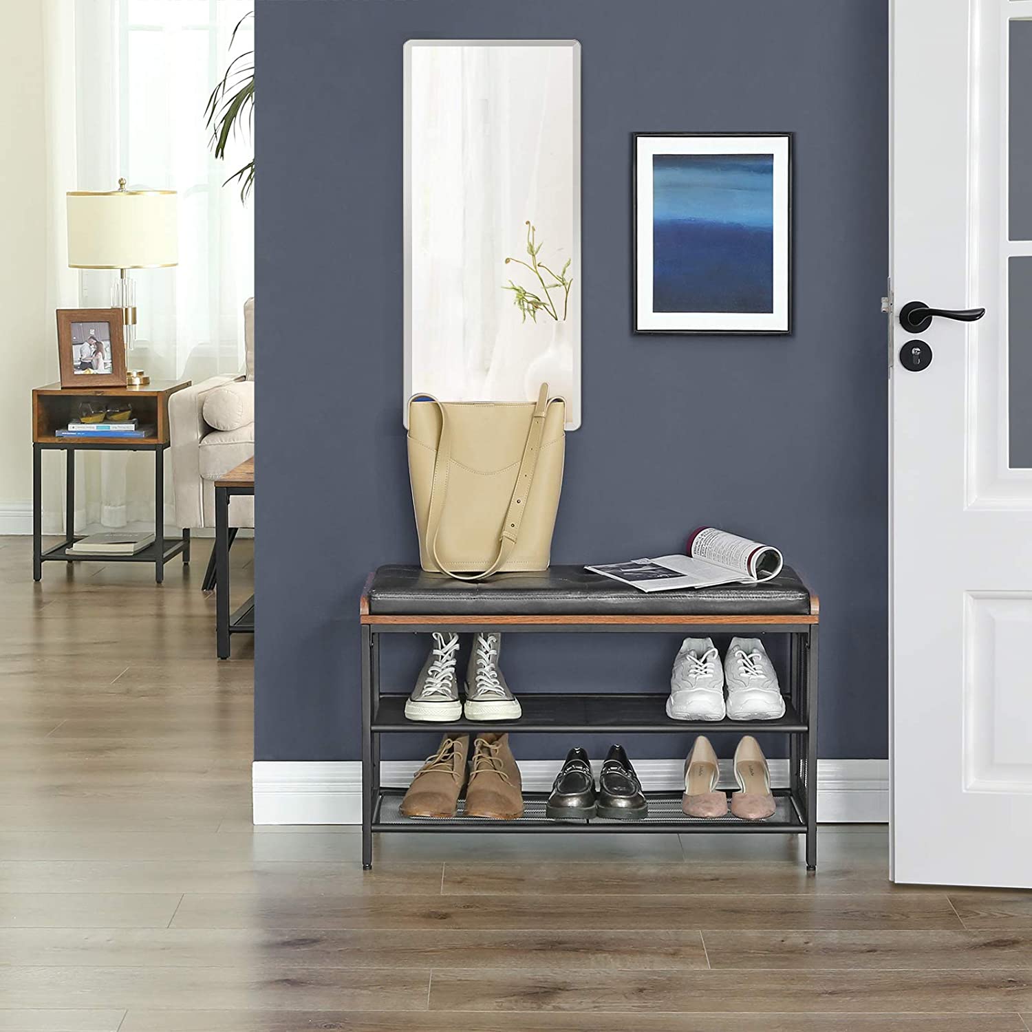 Shoe bench with faux leather seat and wire mesh shelves, dark frame with wooden trim