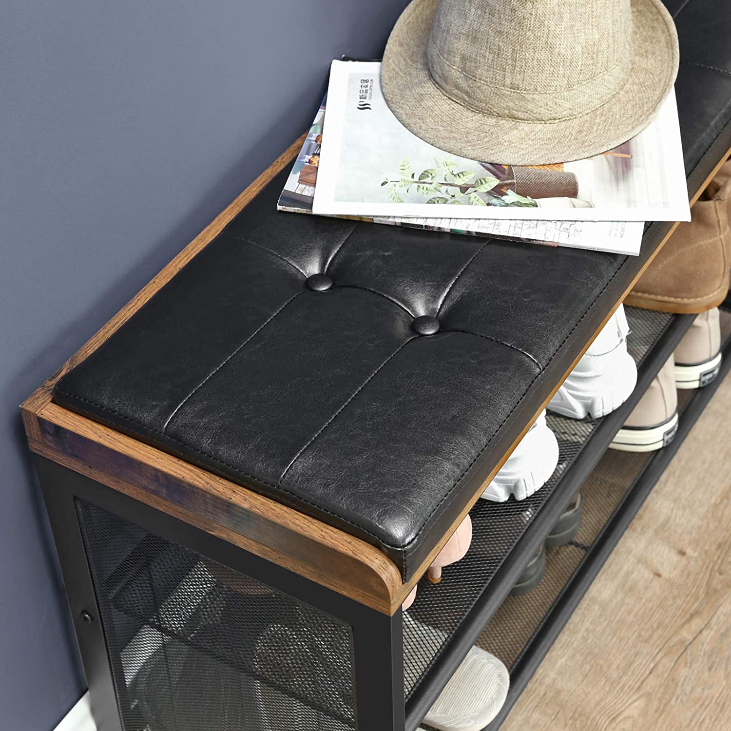 Shoe bench with tufted faux leather seat and wire mesh storage shelves