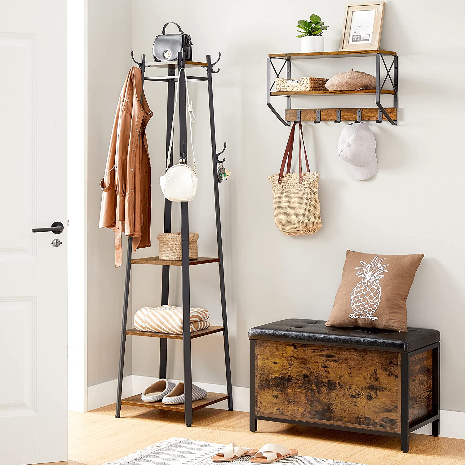 Coat rack with 3 shelves and hanging hooks, shown with bags and a hat.