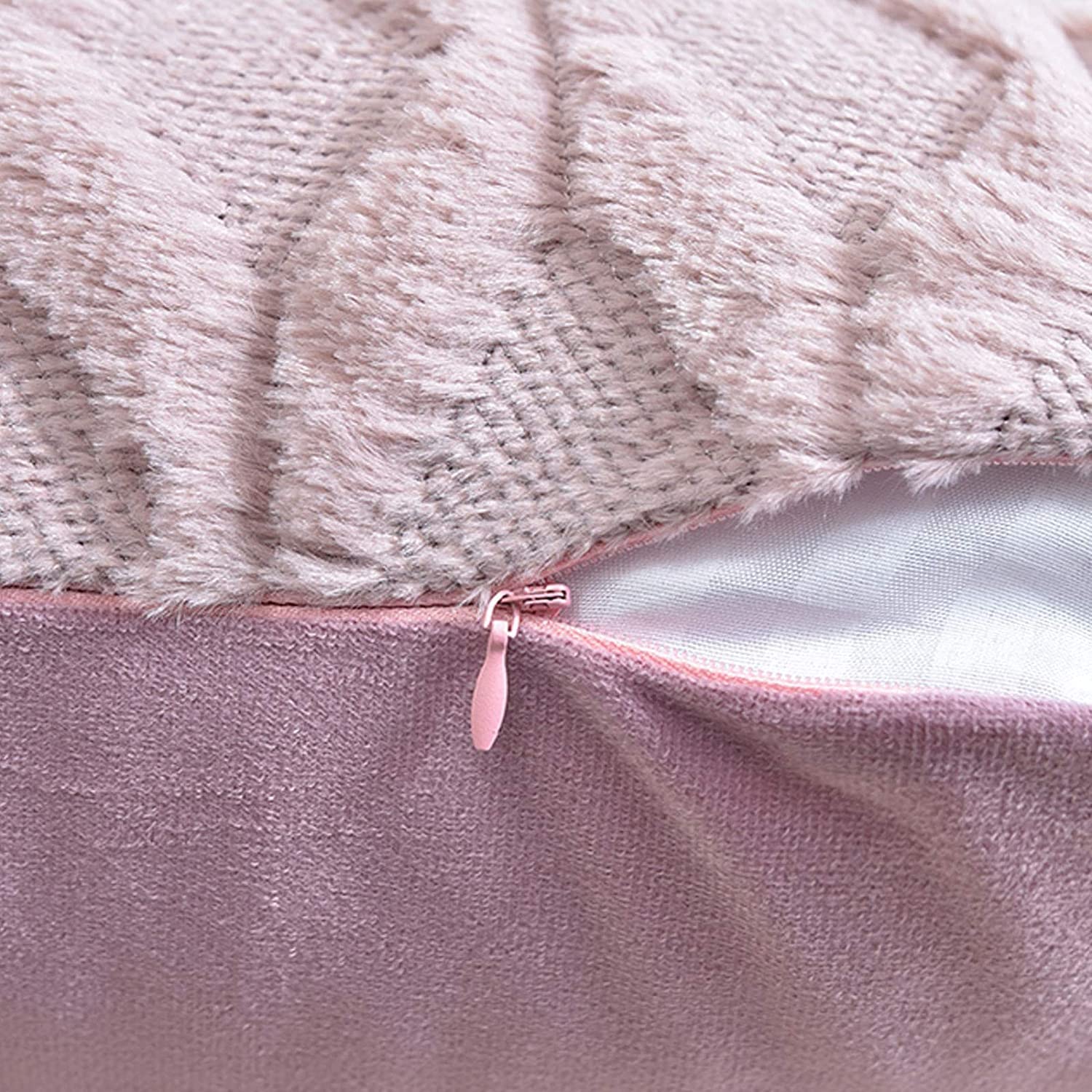 Pink textured pillow cover with visible zipper closure at the side seam