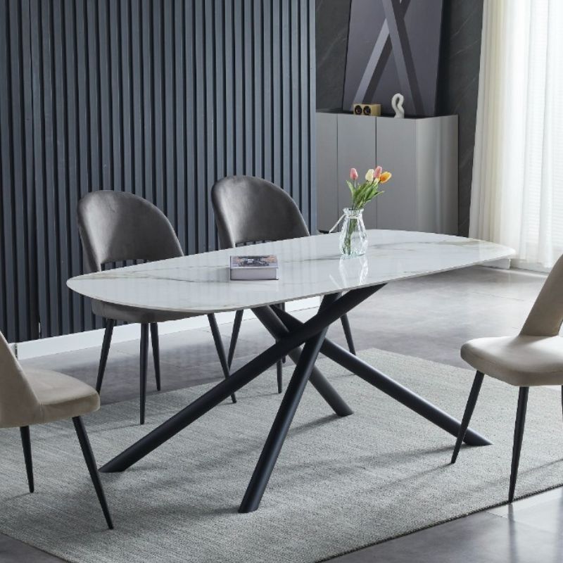 Rounded rectangular dining table with light marble stone top and black legs