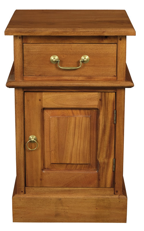 Light pecan wood bedside table with 1 drawer, paneled door, and brass cup handles.