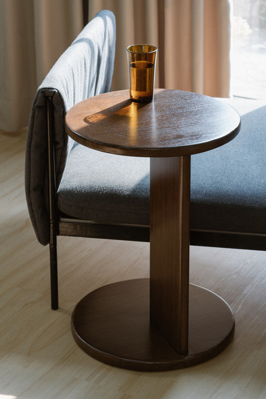 Walnut round timber lamp table with flat lower shelf and tapered pedestal base