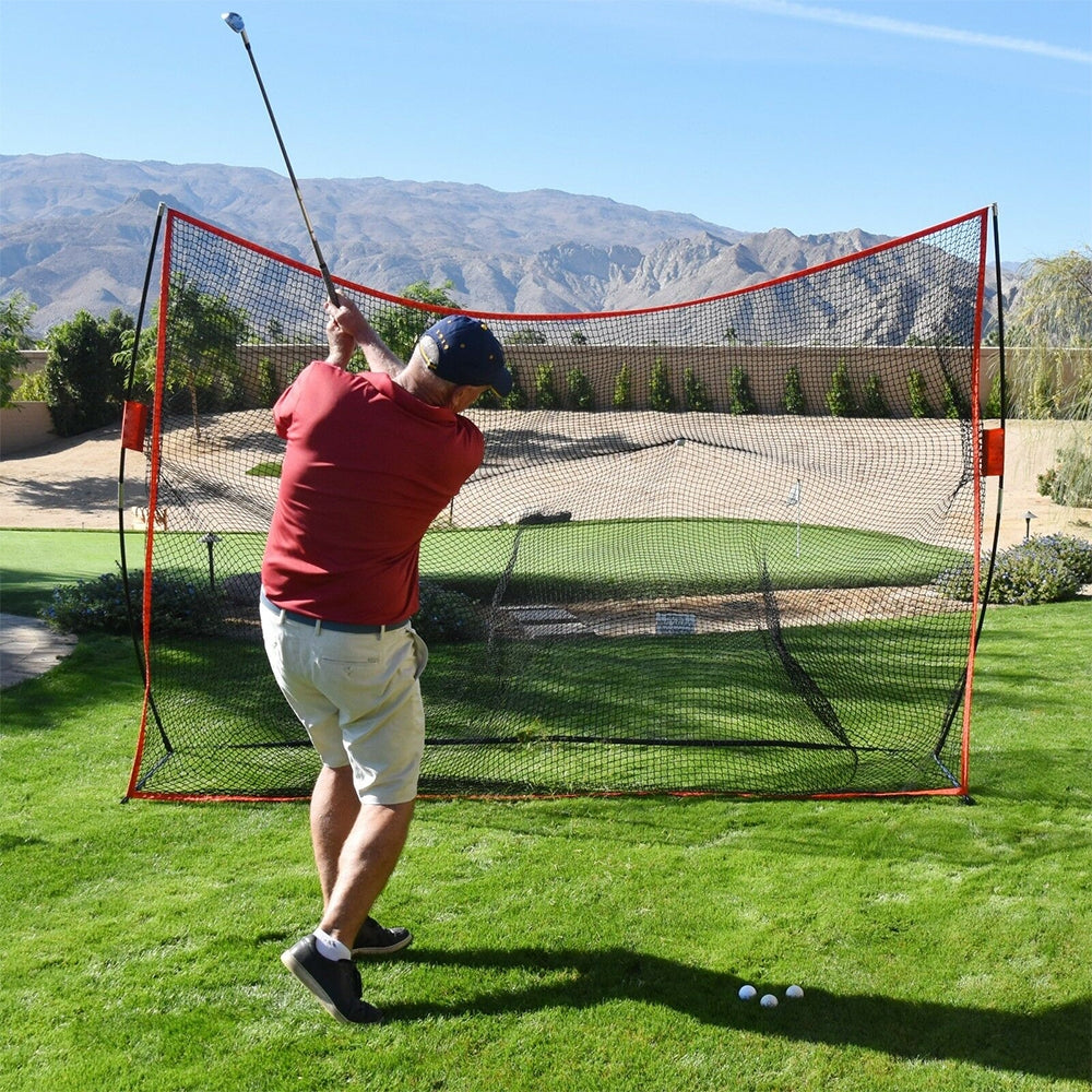 Outdoor golf practice net with red border and black frame, gray knotless mesh