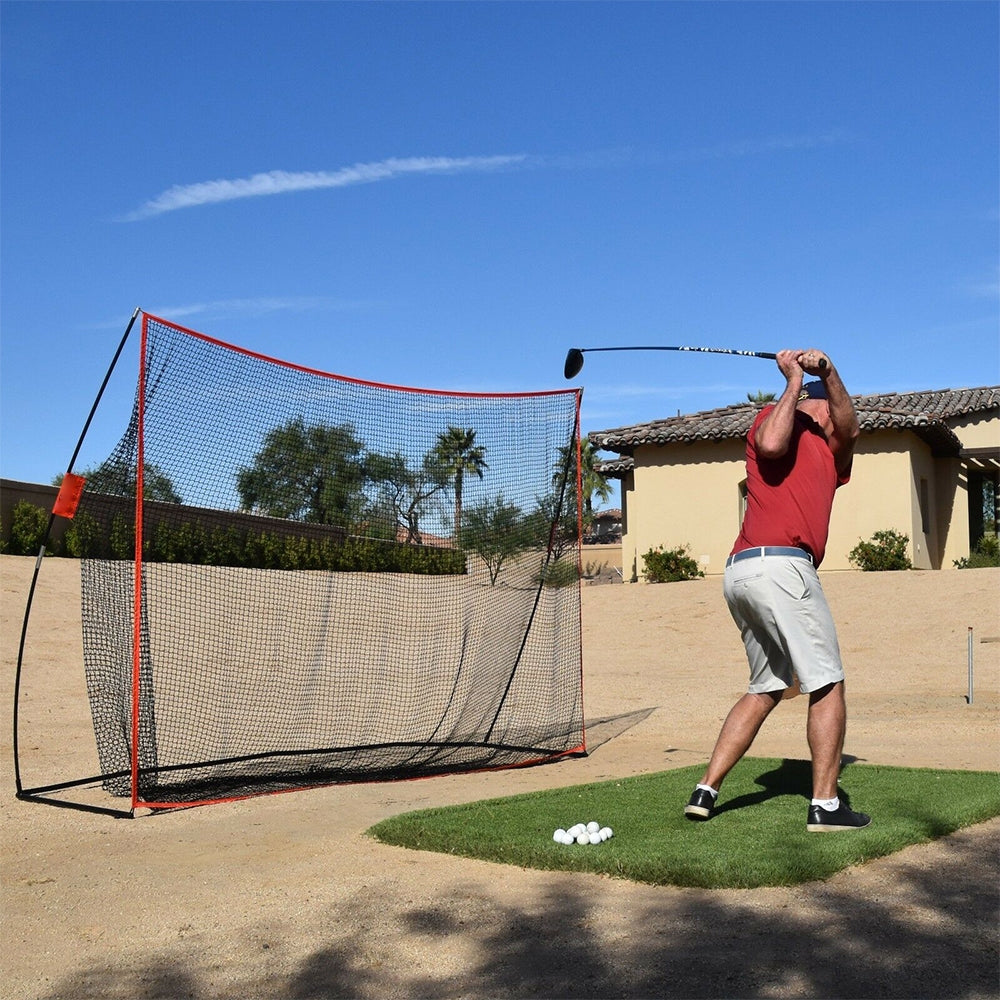 Outdoor hitting practice net with red-trimmed frame and gray knotless net mesh