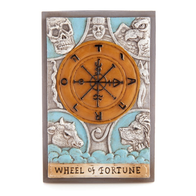 Wheel of Fortune tarot box with circular wheel emblem, cats, and stone figures; title panel