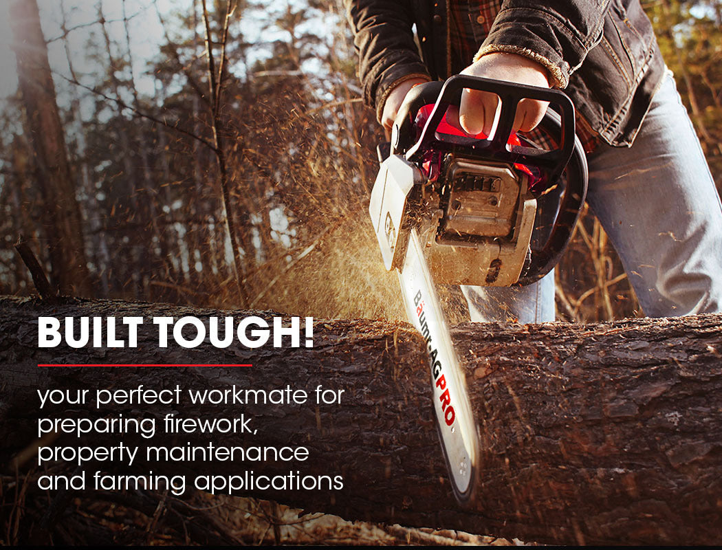 Petrol chainsaw in use with operator wearing gloves, cutting wood with chain