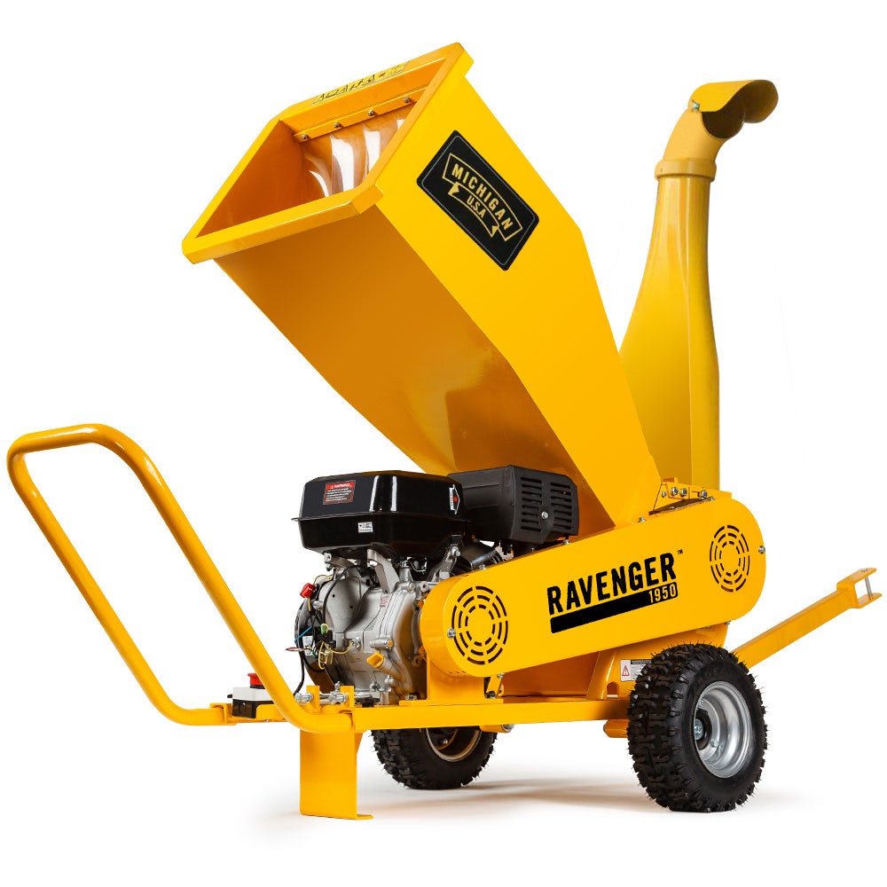Yellow towable wood chipper with hopper, engine, and discharge chute, RAVENGER 1950