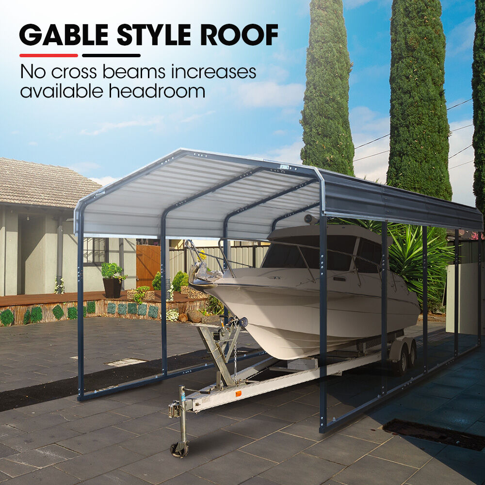 Single carport shelter with gable roof, boat under cover and open front