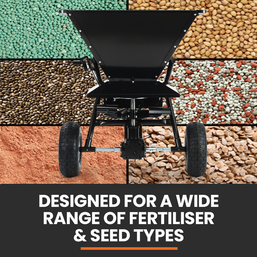 Tow-behind spreader hopper opening with mixing mechanism above granules