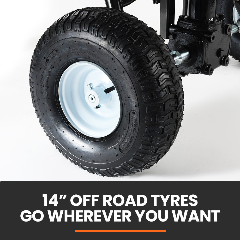 Off-road tyres on tow-behind spreader with steel axle and white wheel rim