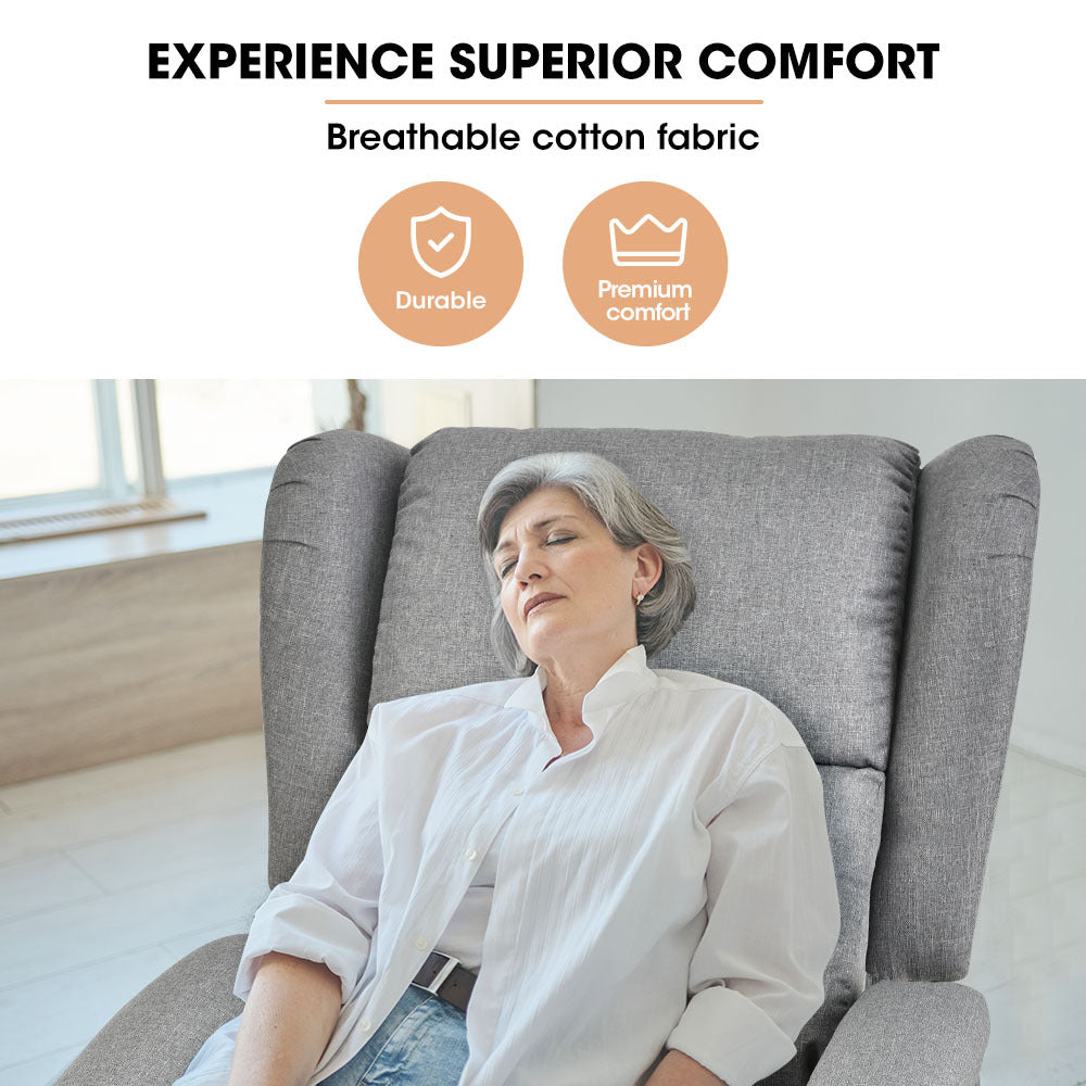 Grey recliner chair with padded headrest, tall back, and supportive cushioned seat.