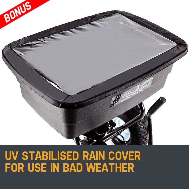 Black-and-gray rain cover fitted over the spreader hopper with secure edges