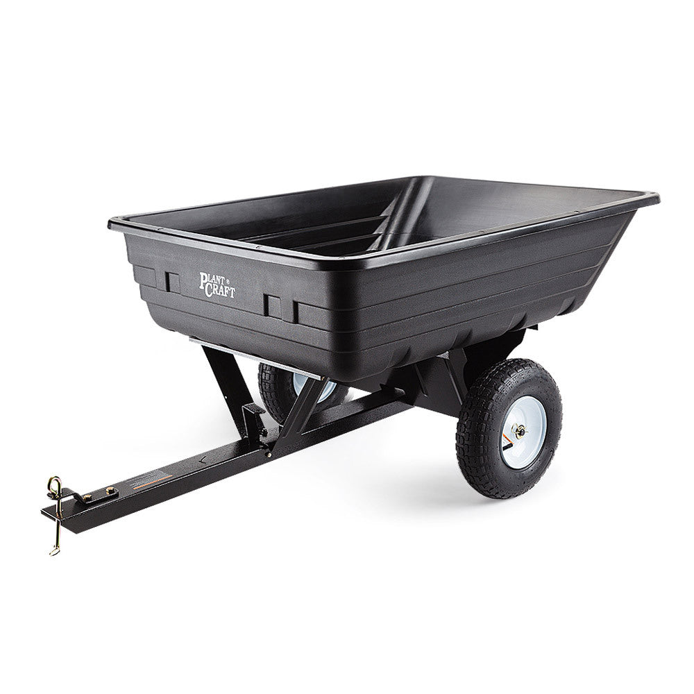 Black poly dump cart with deep tray, two wheels, and tow bar