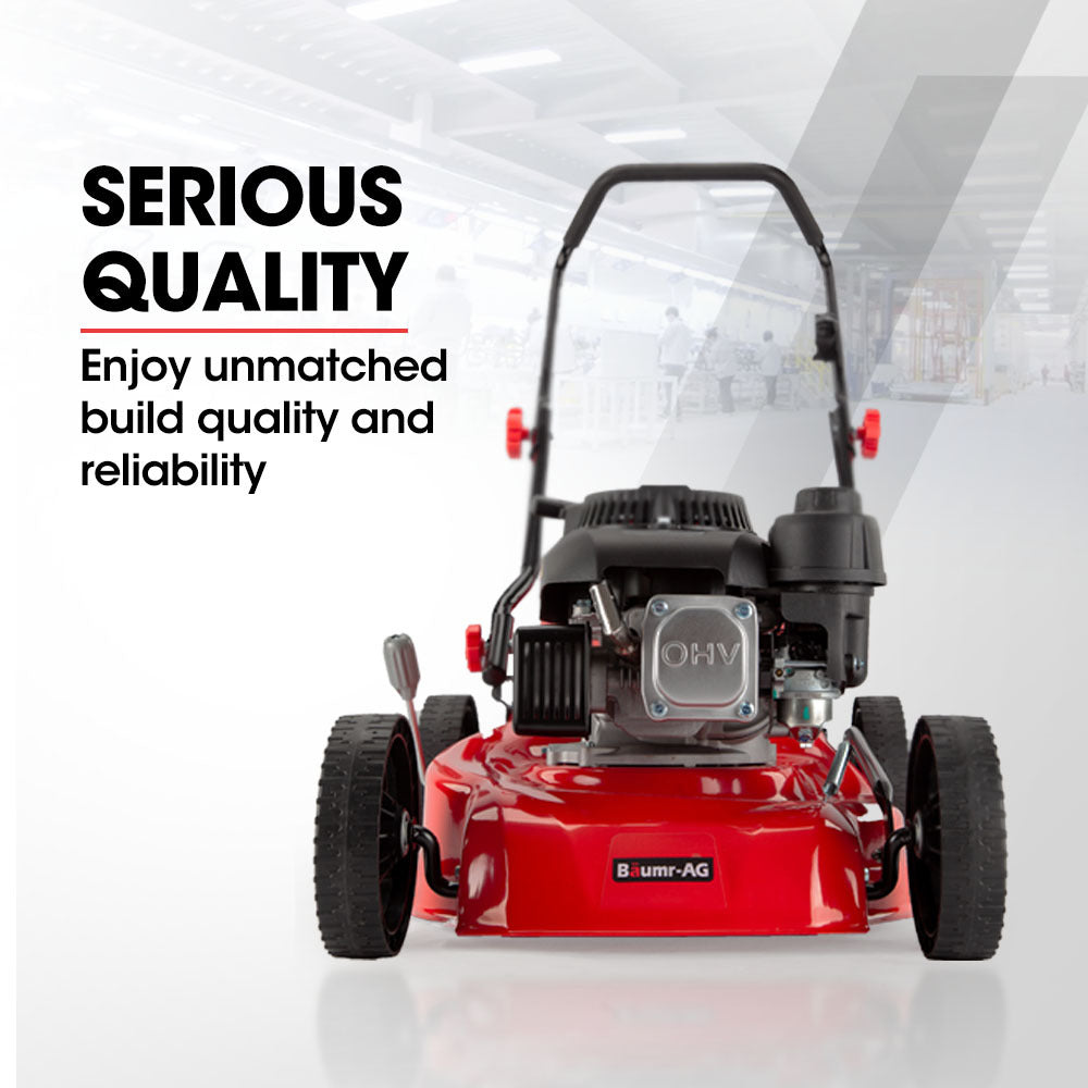 Red petrol push lawn mower front view with black handle and engine cover