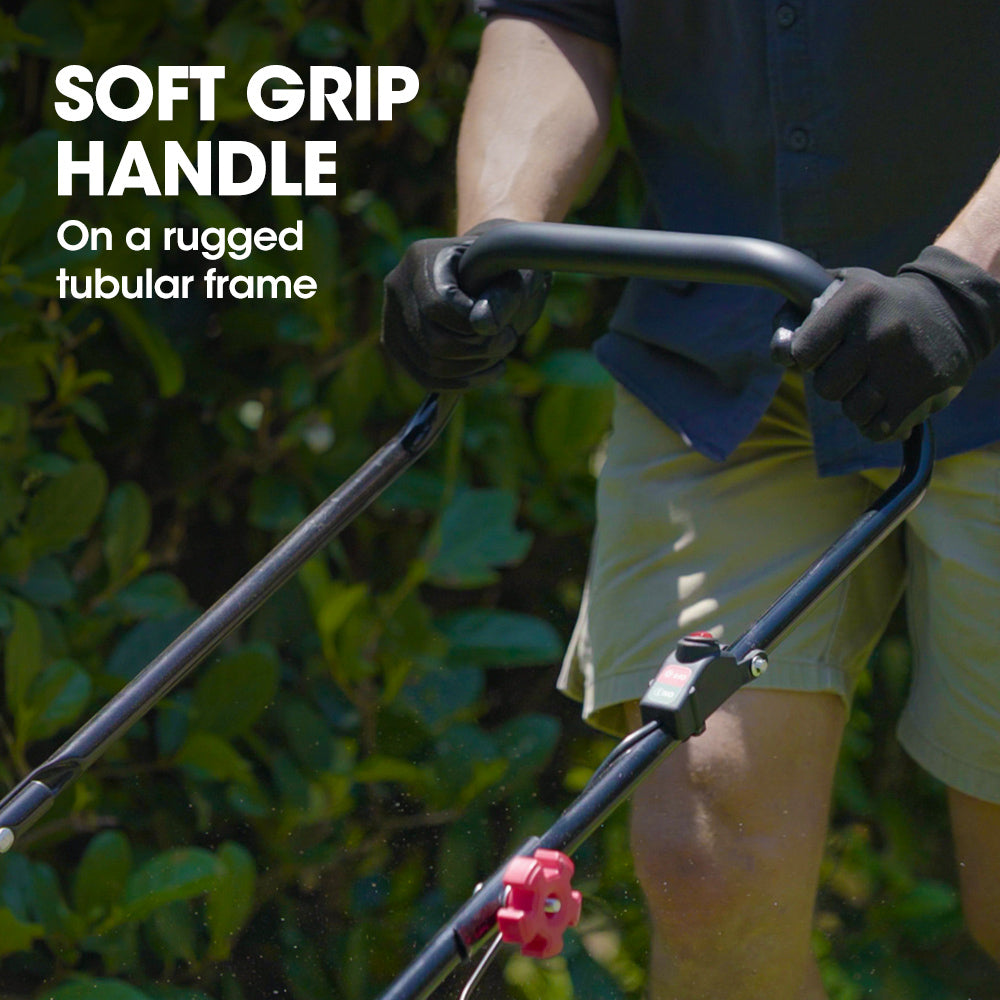 Soft-grip handle on tubular frame of a petrol push lawn mower with red lever.