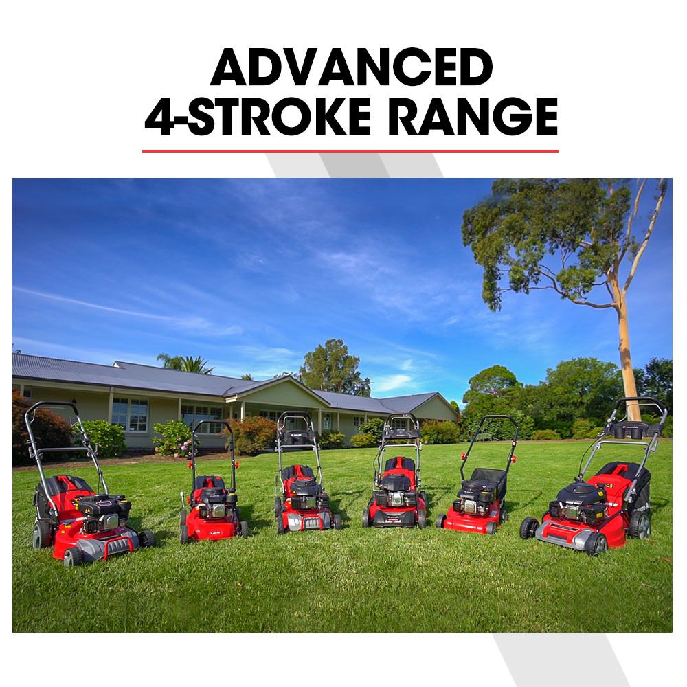 Row of red 4-stroke lawn mowers with black decks standing on grass