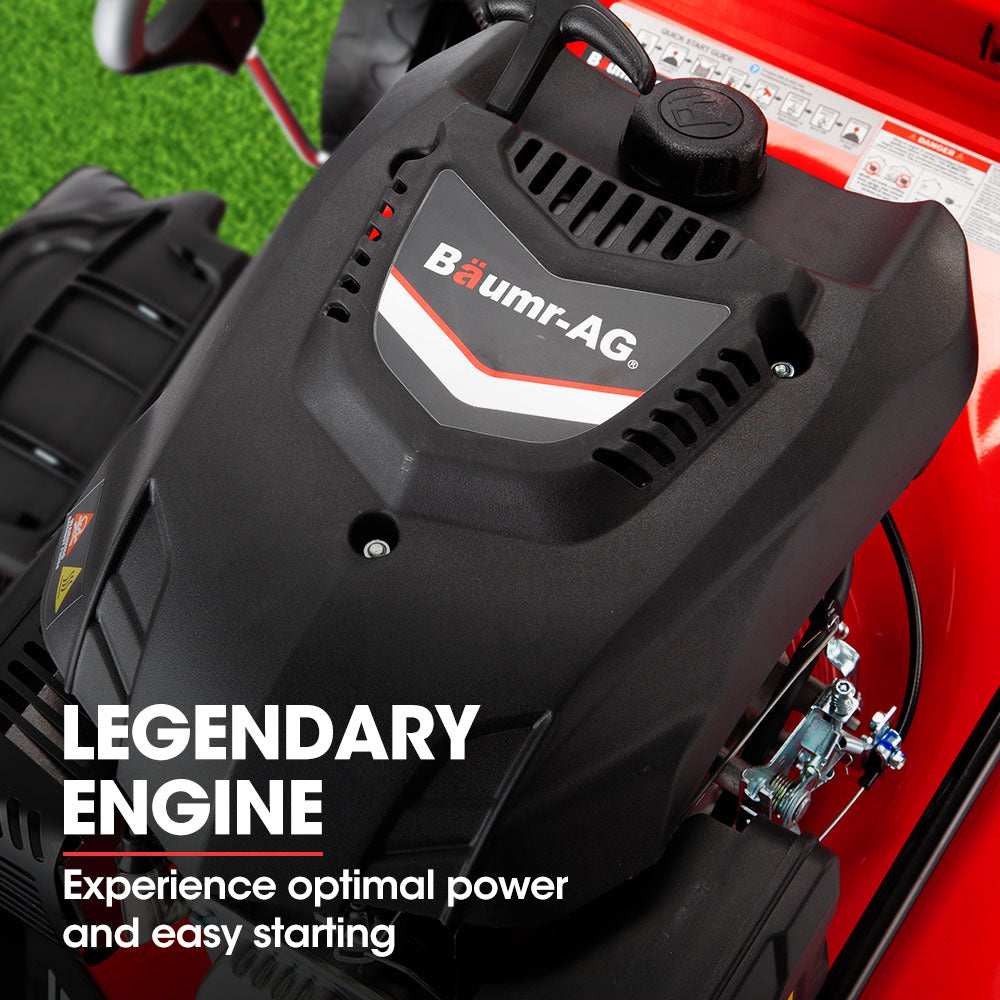 Baumr-AG lawn mower engine cover in black on a red mower body