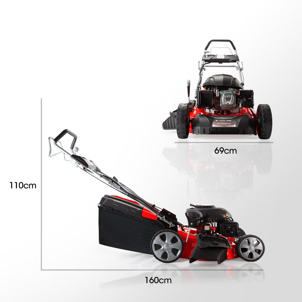 Red and black lawn mower shown from angled side with wheels and deck