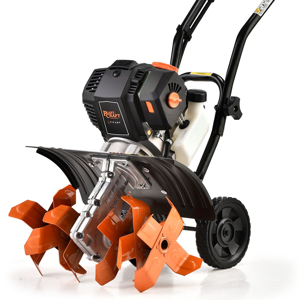 Handheld petrol garden cultivator with orange tines and black engine housing