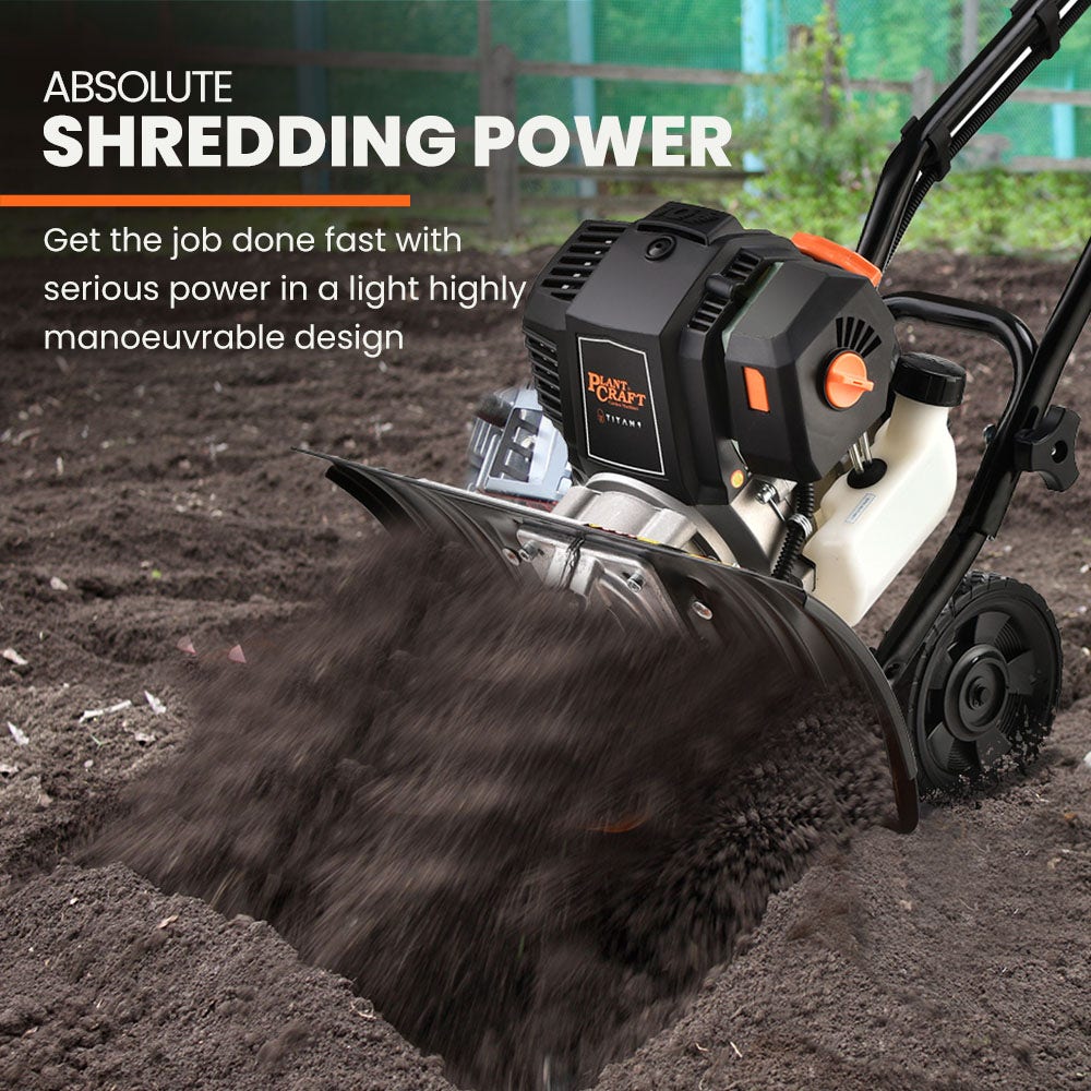Handheld garden cultivator with black shredding guard and orange tine blades