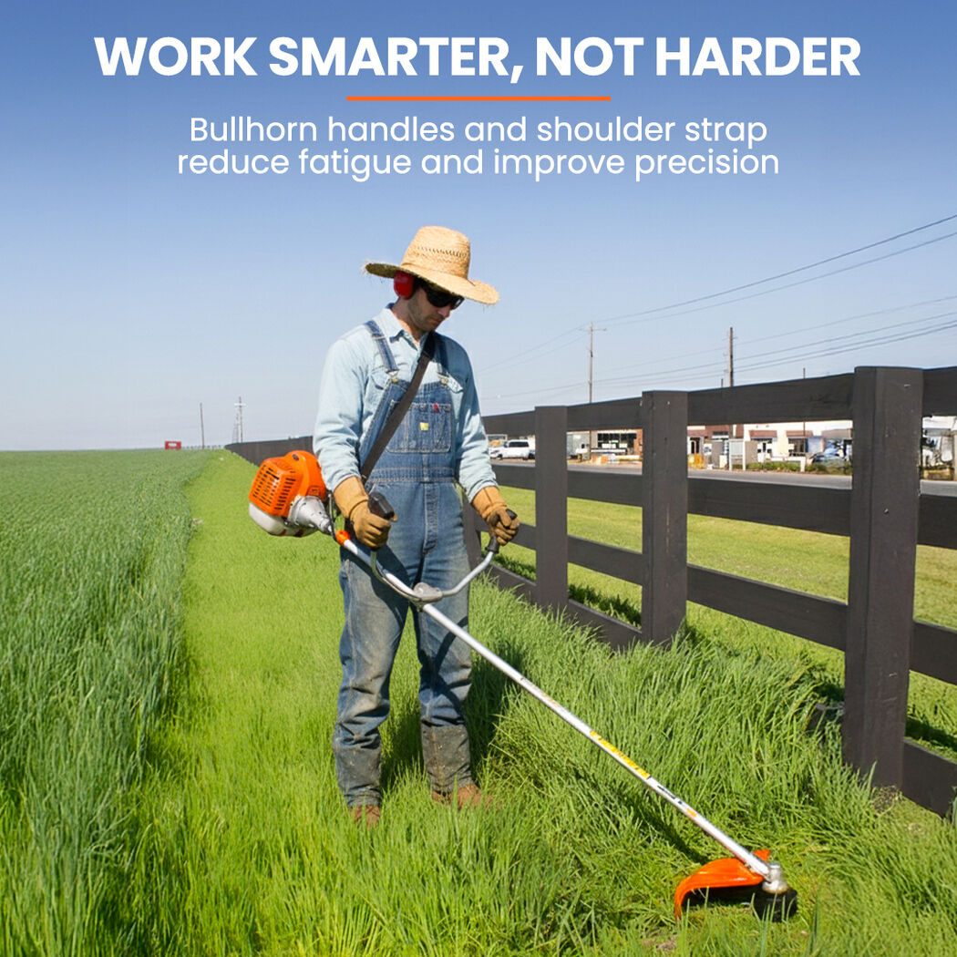 Orange brush cutter with long shaft and bullhorn handle for grass edging