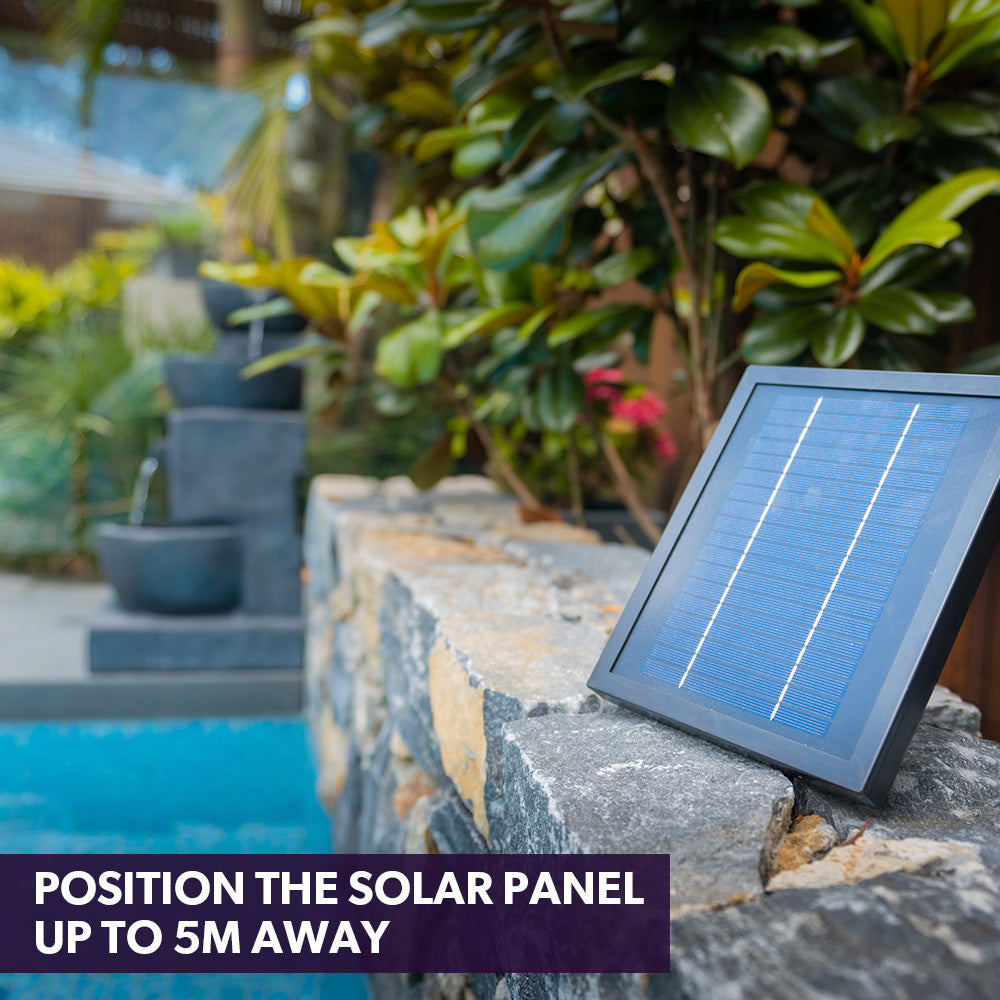 Solar-powered charcoal water fountain with four bowls and angled solar panel