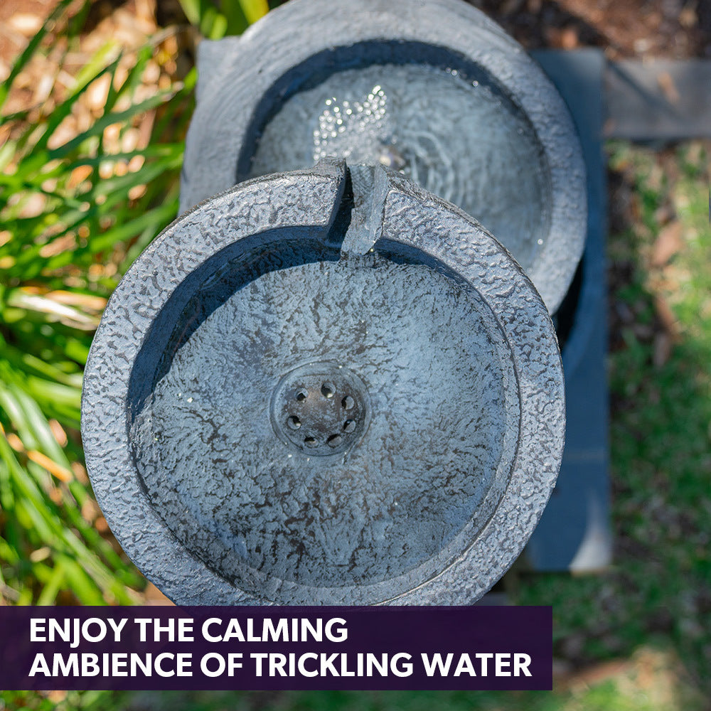 Charcoal top bowl of water fountain with small glowing LED light points