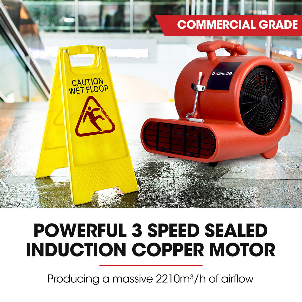 Red carpet air mover blower fan on floor with front vent and circular fan intake