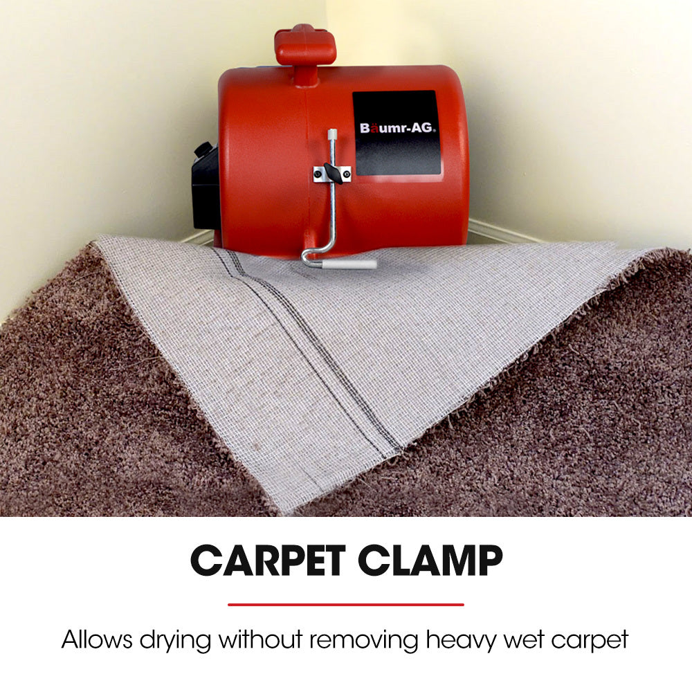 Red carpet air mover blower fan with carpet clamp and front air vent over carpet
