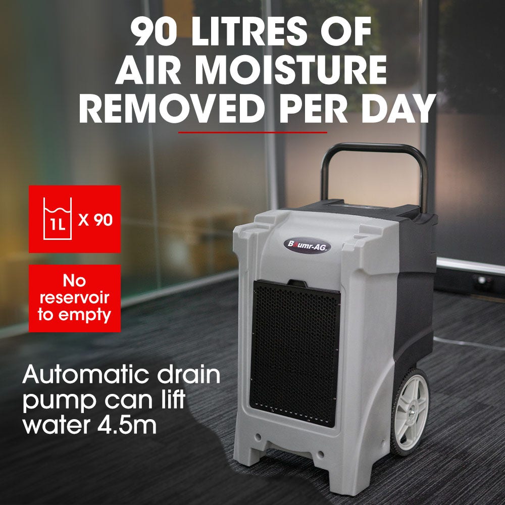 Portable air dehumidifier with front grille, top handle, and caster wheels for drainage