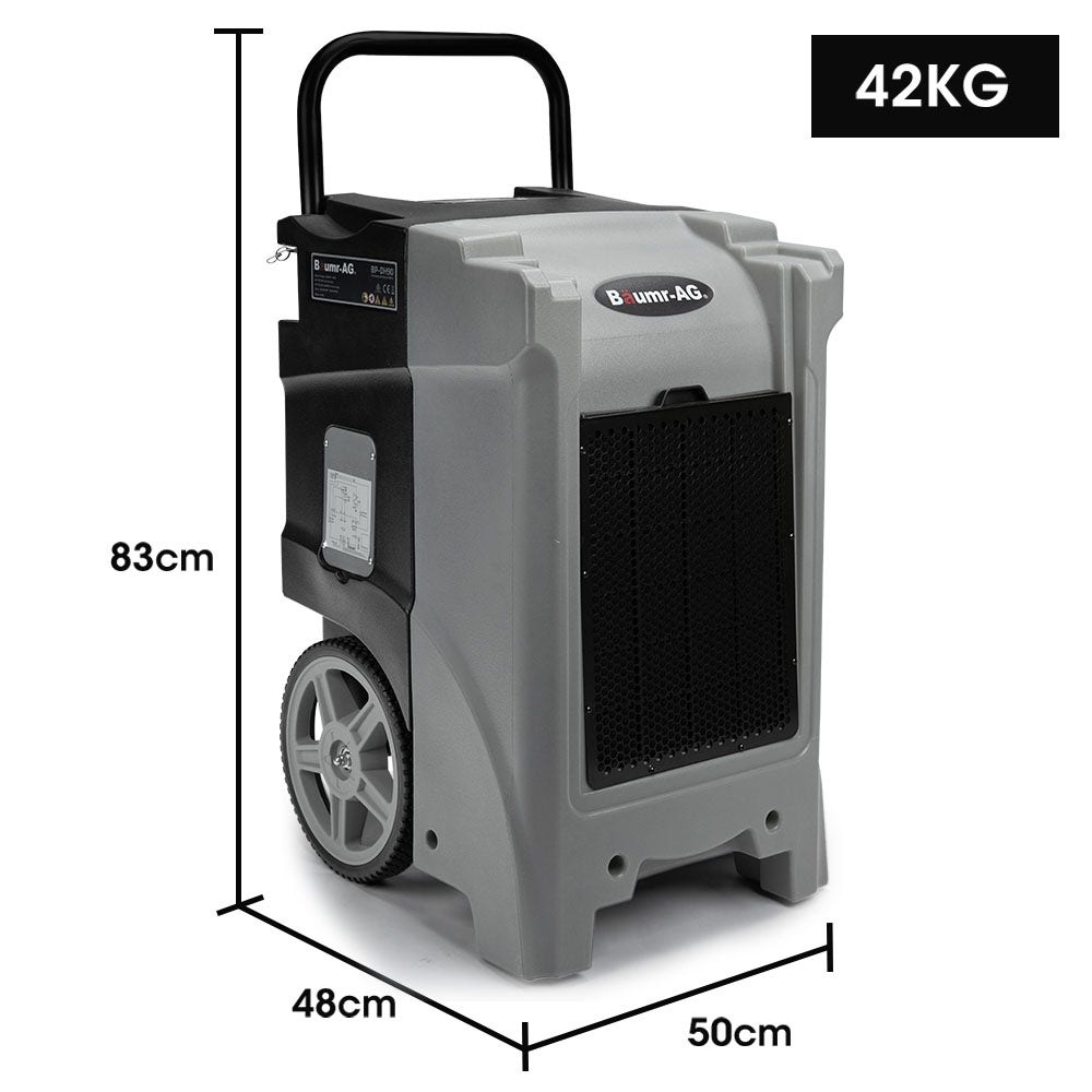 Portable dehumidifier with top carry handle, front vent, side label panel, and caster wheels