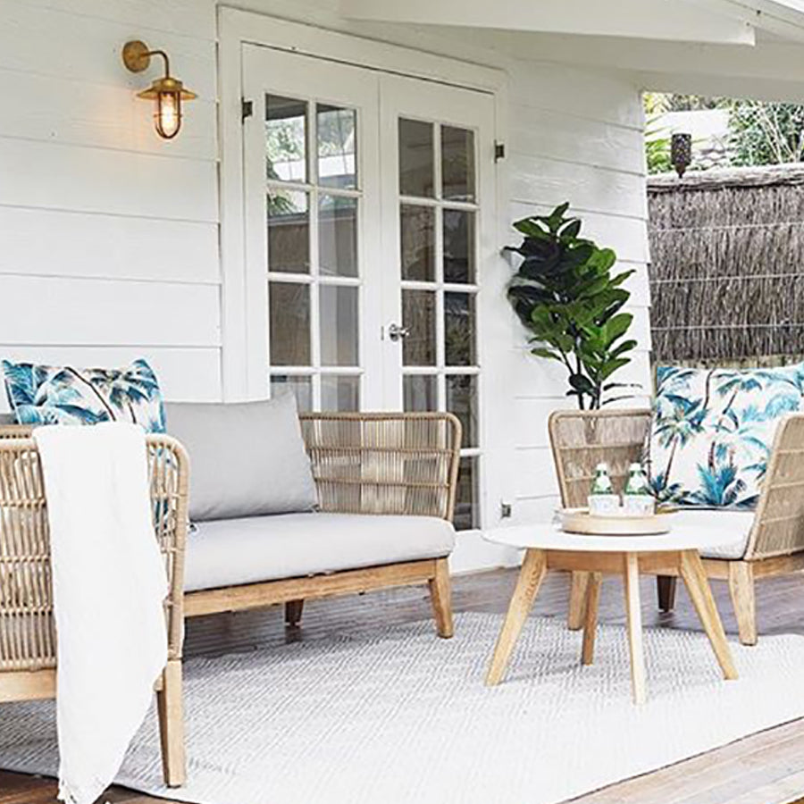 Palm tree cushion cover with piping, cream and teal-blue palm leaf design