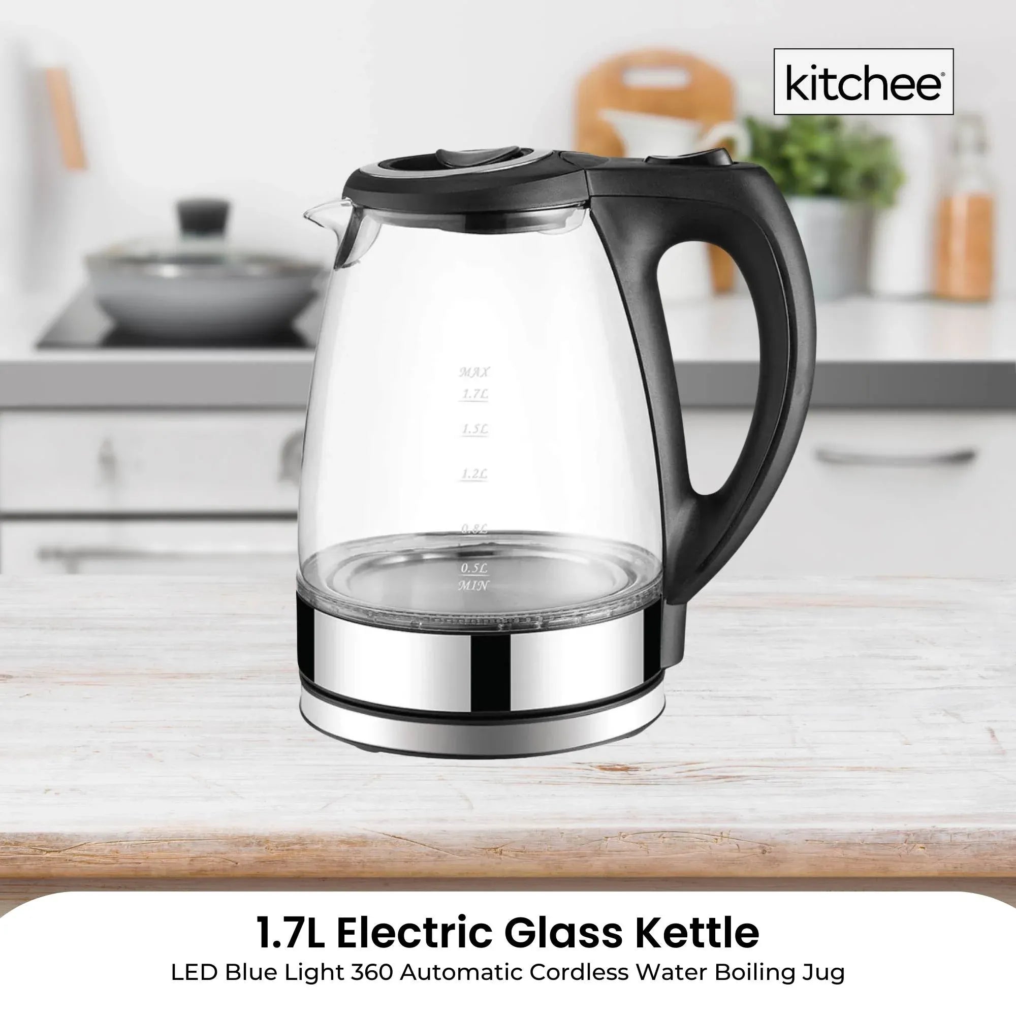 Clear glass electric kettle with black handle, 360 cordless base, blue lit interior