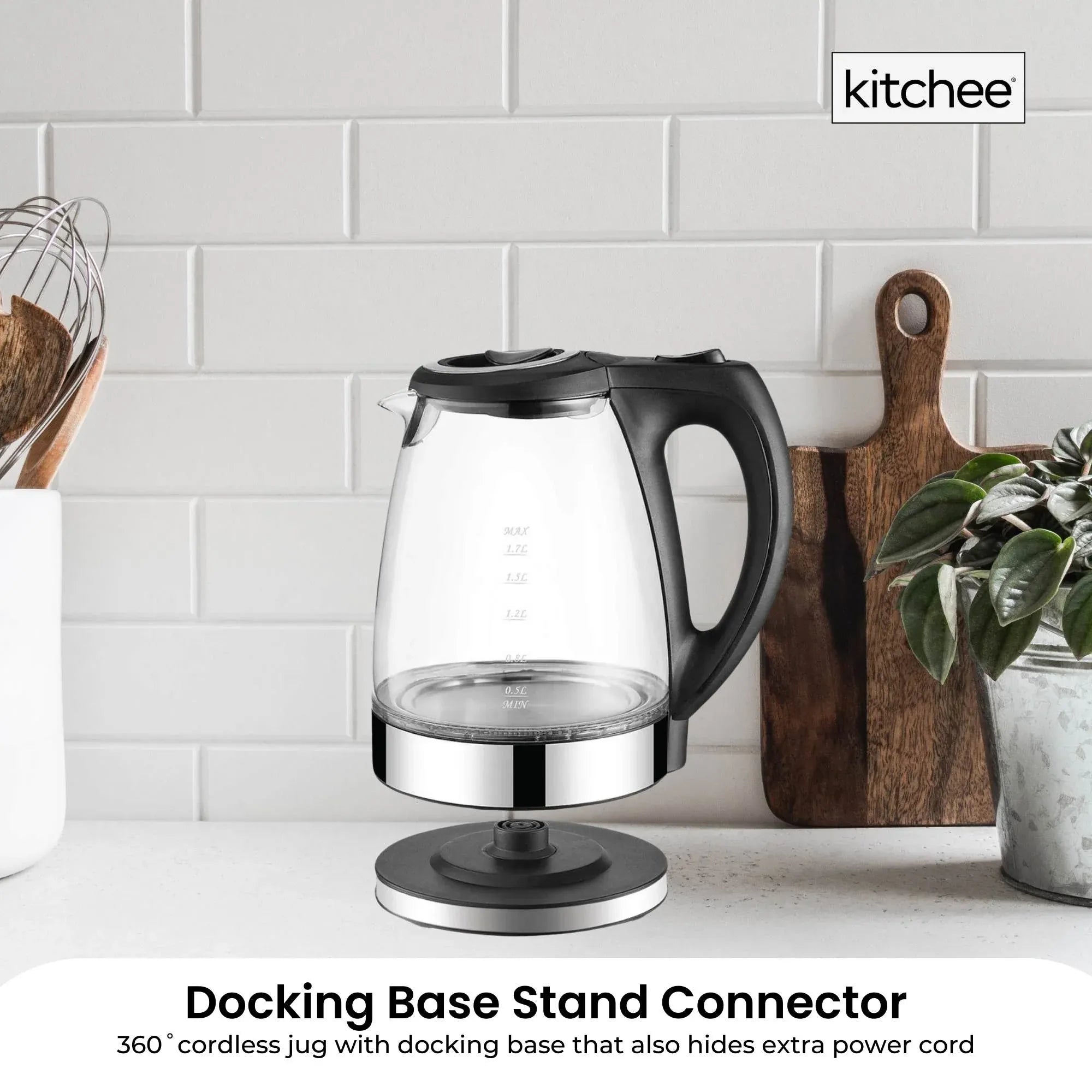 Cordless glass electric kettle resting on round docking base stand