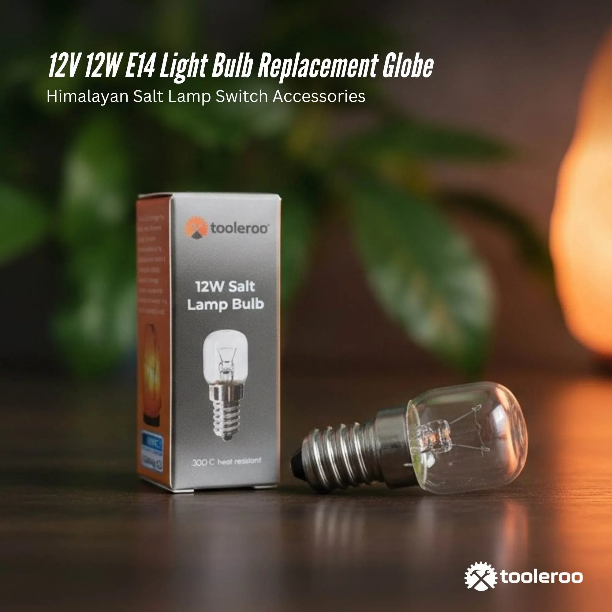 E14 replacement bulb with clear glass globe and metal screw base