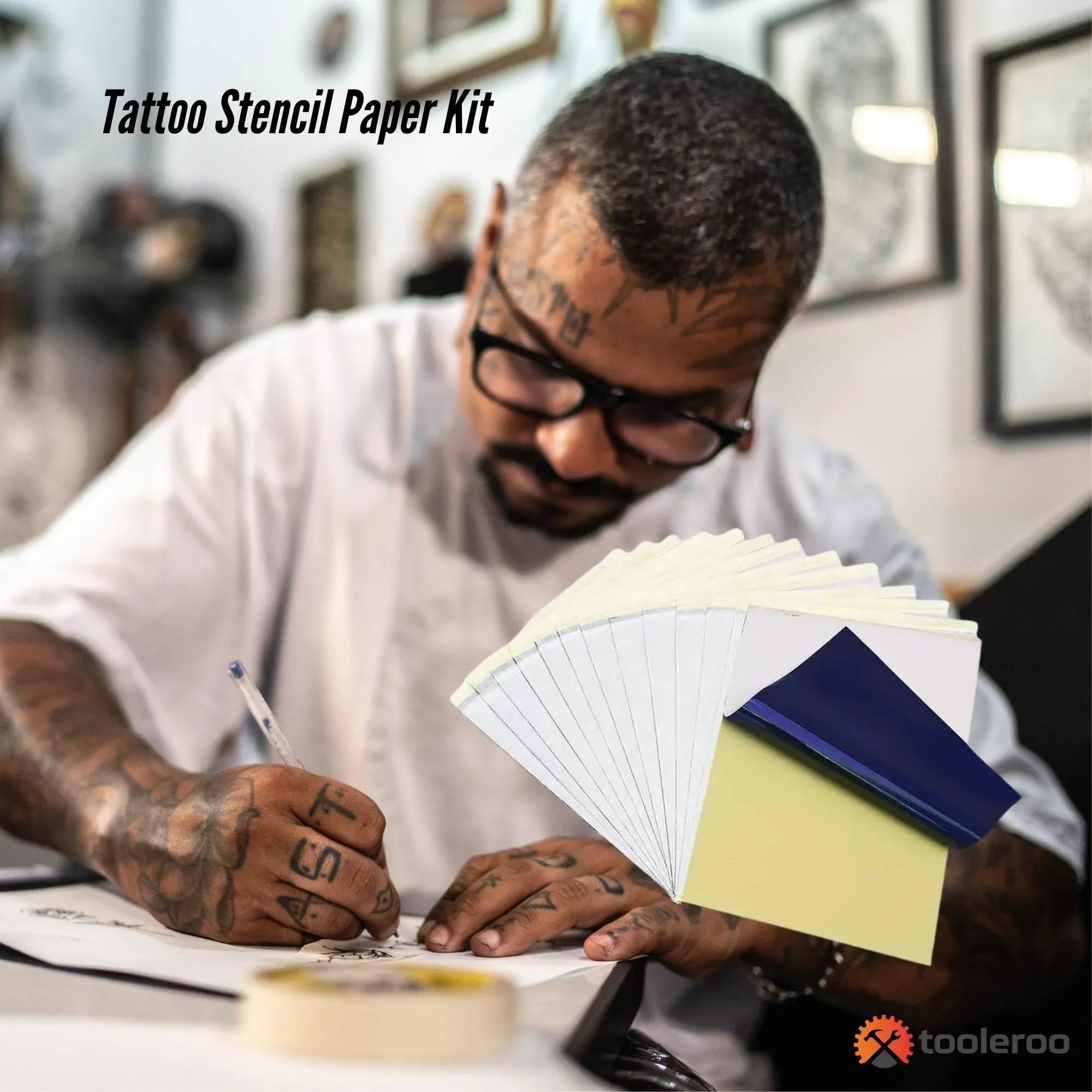 Thermal tattoo stencil paper pack with stacked A4 sheets and dark blue backing