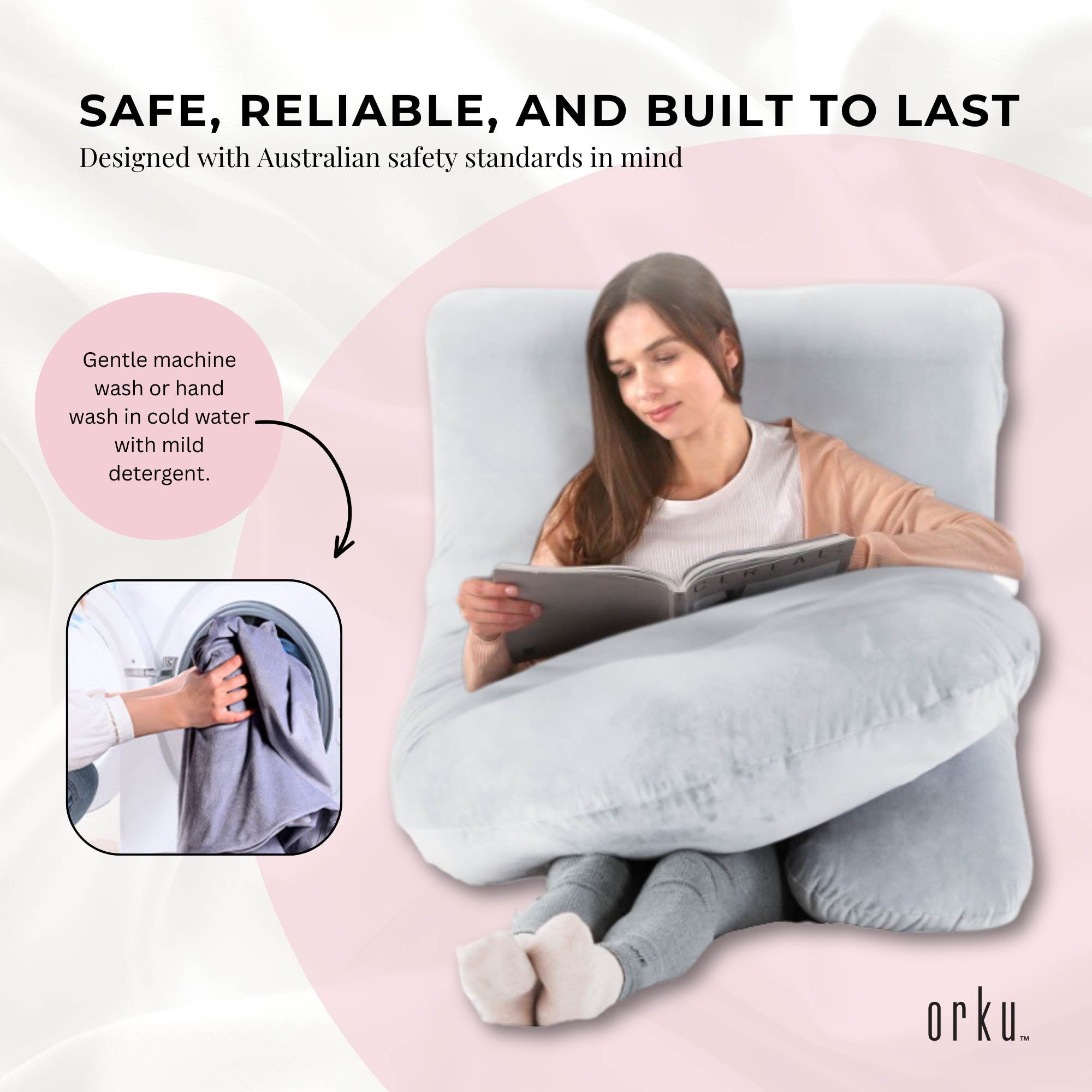 J-shaped maternity pregnancy pillow, light gray, held around the body while reading