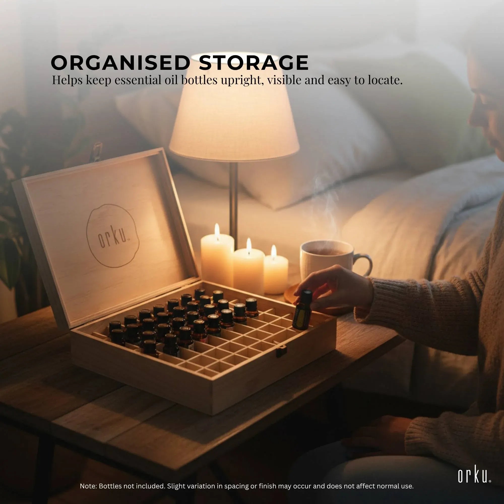 Wooden essential oil storage box open with upright bottle slots and compartment frame