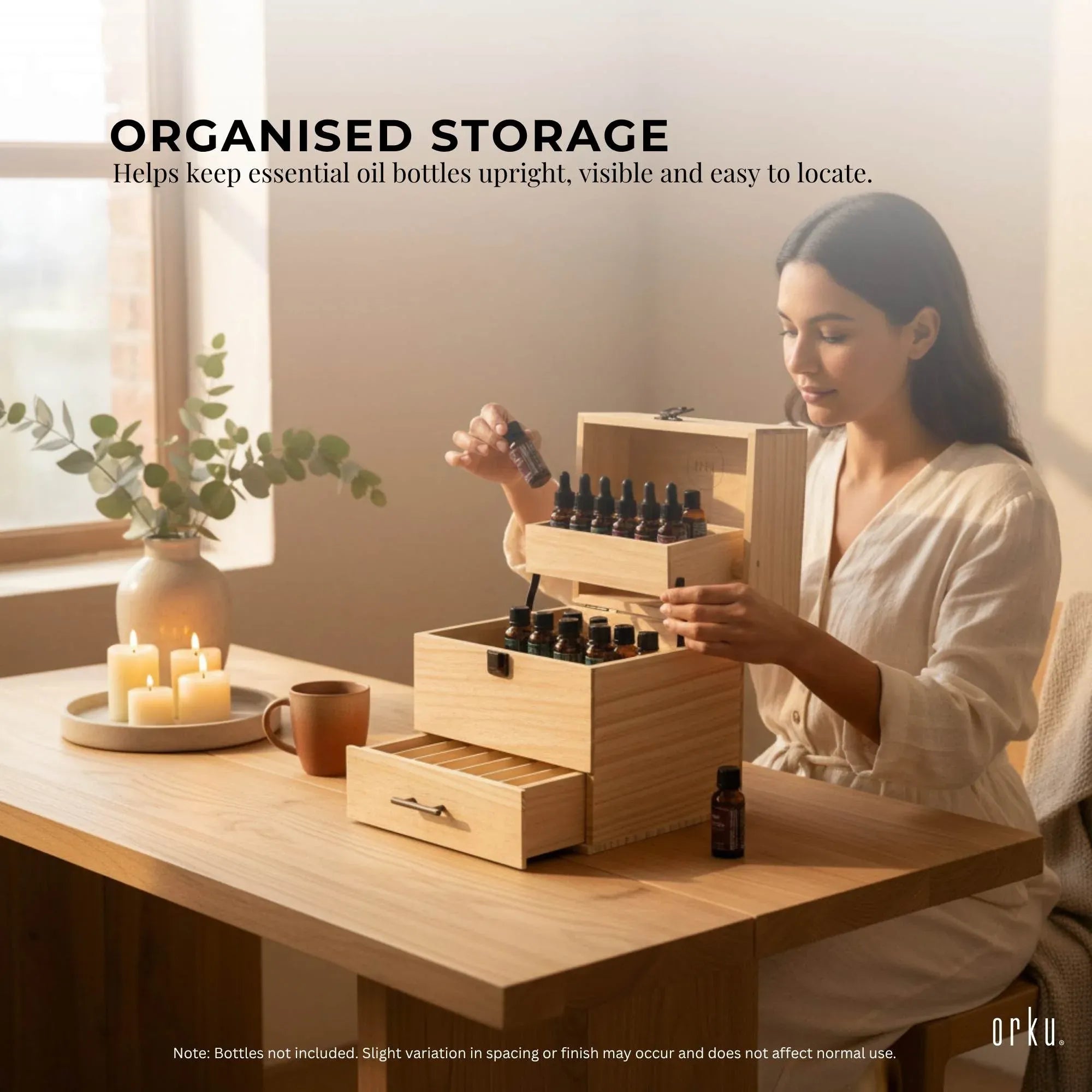 Wooden essential oil storage box with open drawers and tiered slots