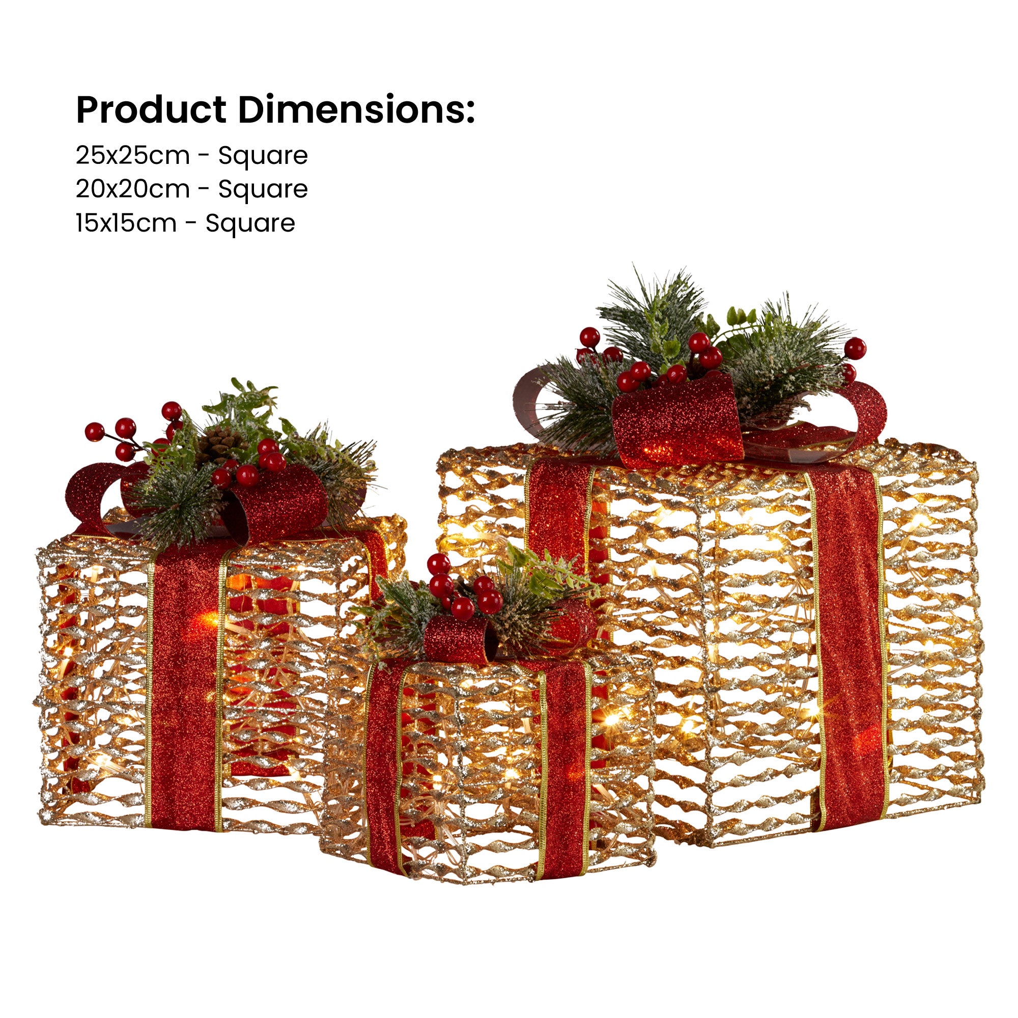 Three champagne gift boxes with red ribbon bows, pine greenery and warm LED lights
