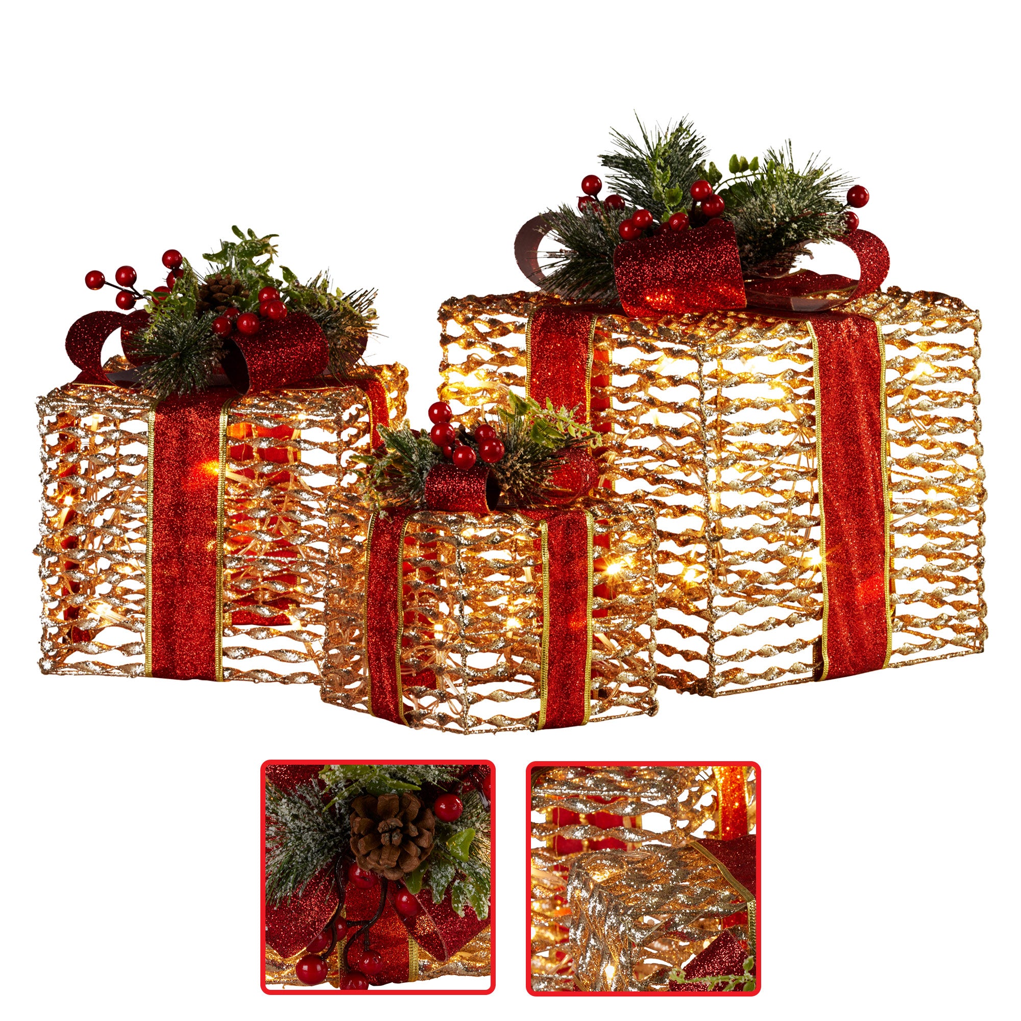 Three champagne mesh gift boxes with red ribbon bows, pine greenery and warm LED lights
