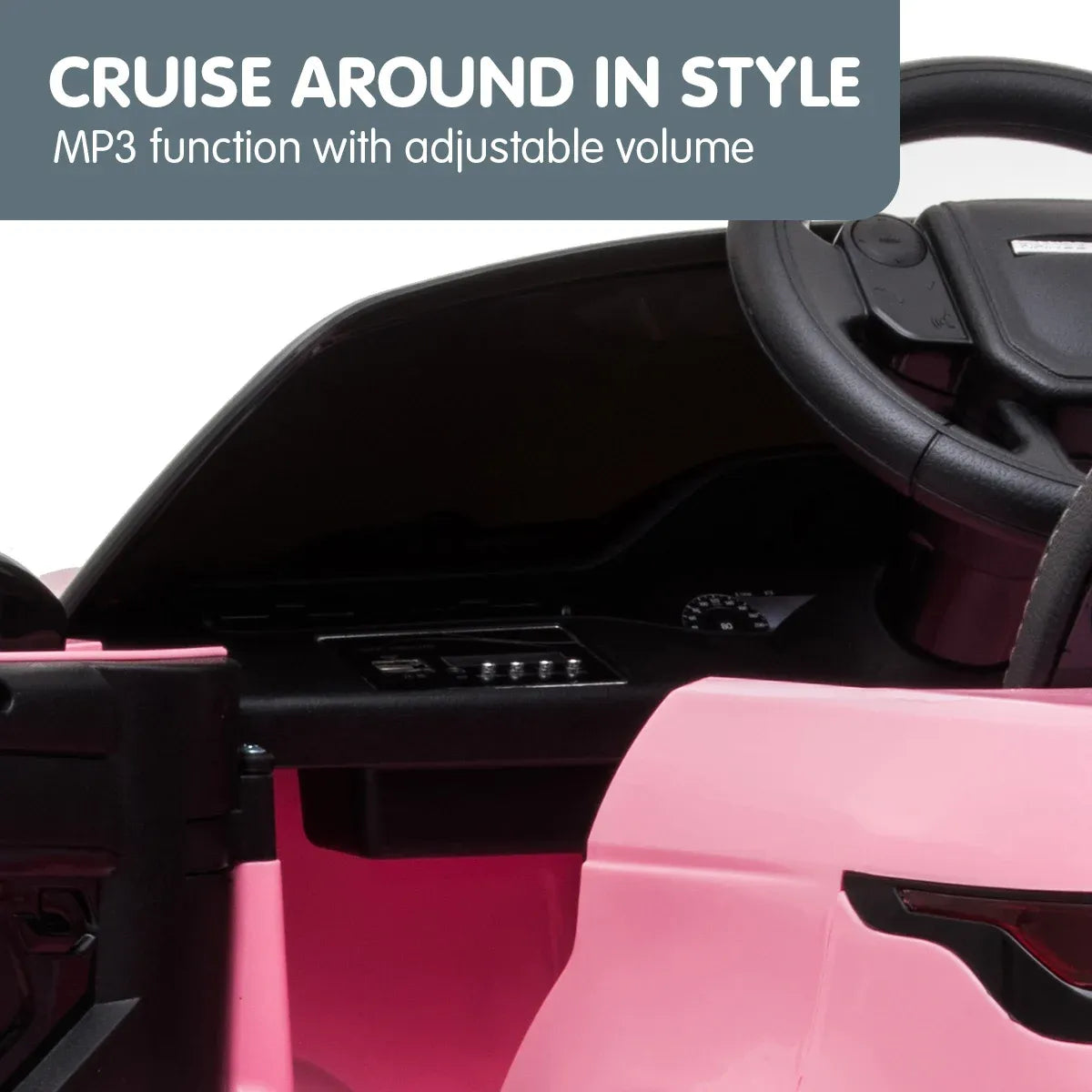 Pink kids ride-on car interior with black steering wheel and dashboard